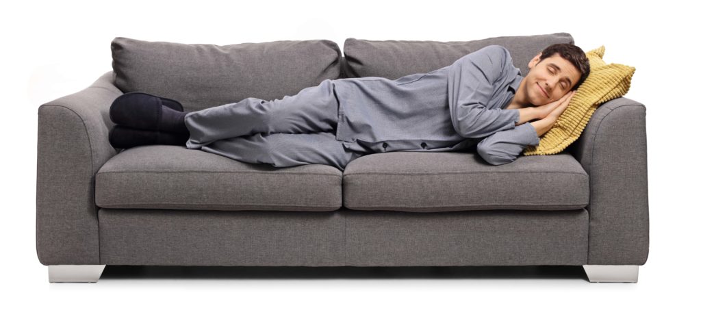 Man sleeping peacefully on a couch