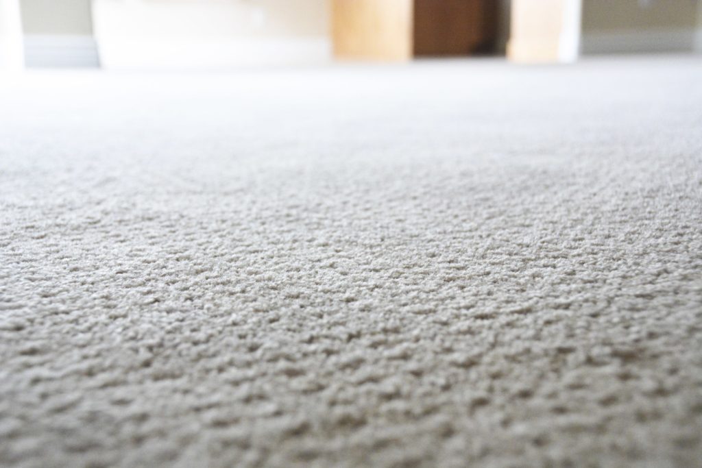 Close-up of new white carpet installed in a Colorado rental property